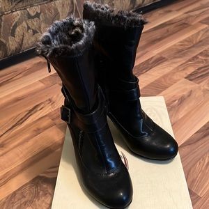 Black boots size 8 1/2 gently work.